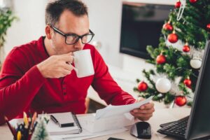 Man working at a desk.