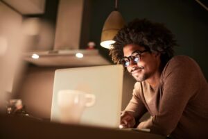 Man using a laptop.