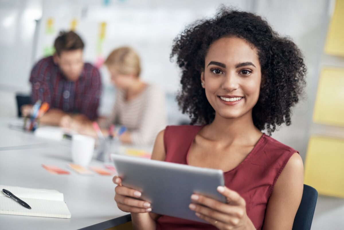 A smiling woman learning soft skills