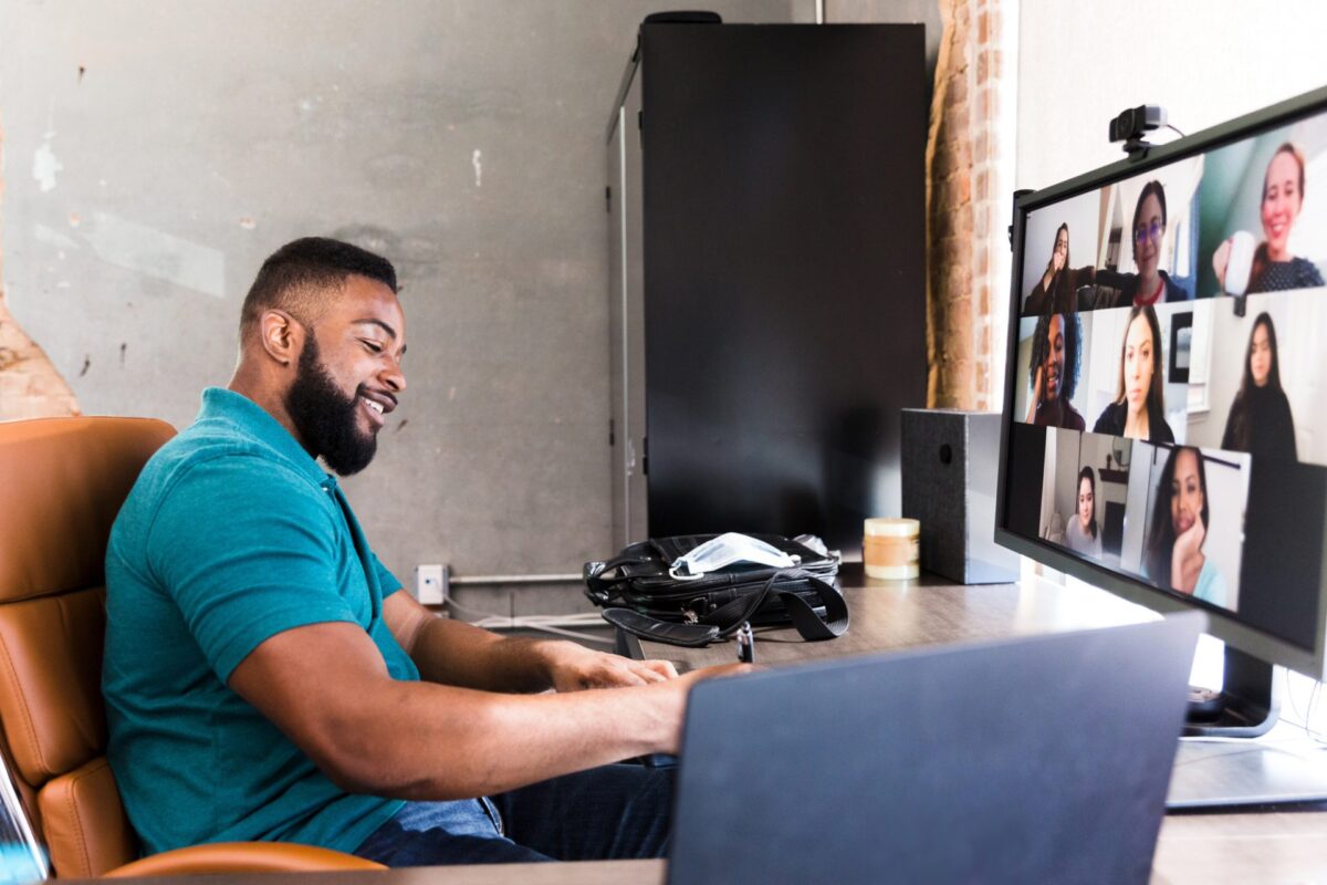 Businessman meets with colleagues virtually