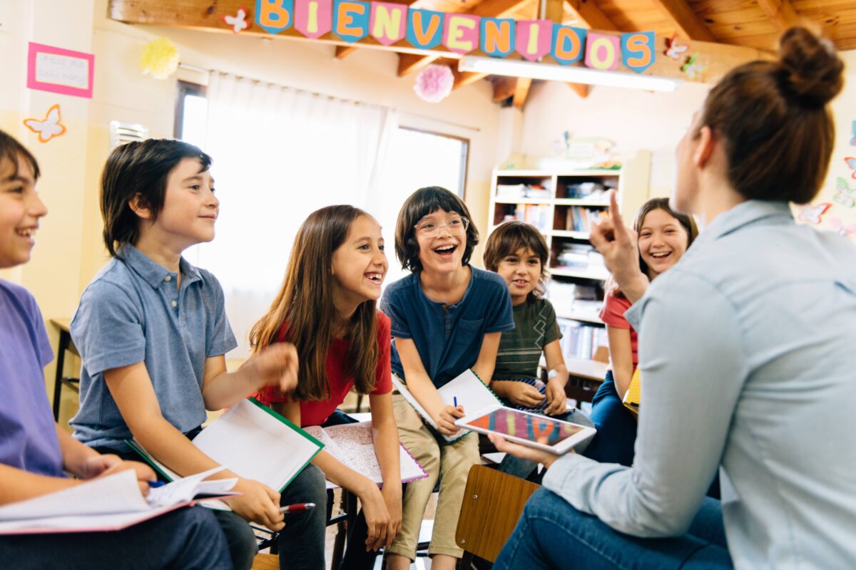 Teacher providing instructions to TESOL students