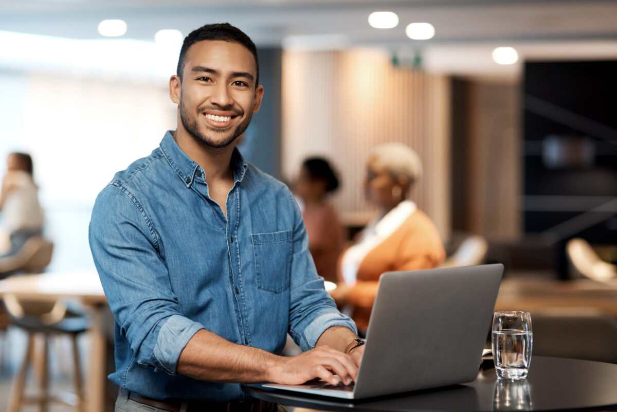 an employee managing change in the workplace from a laptop