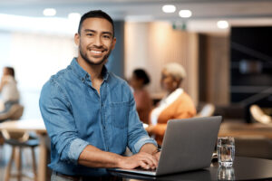 an employee managing change in the workplace from a laptop