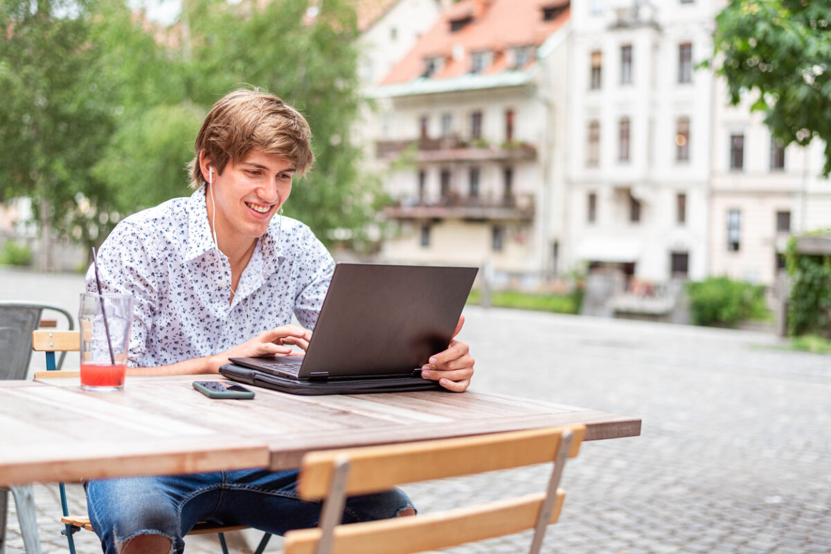distance learning student working on his employability skills with laptop