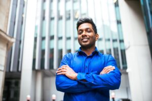 a man in a blue shirt - how to find your dream job