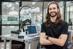 Example of AI careers - man working in robotics