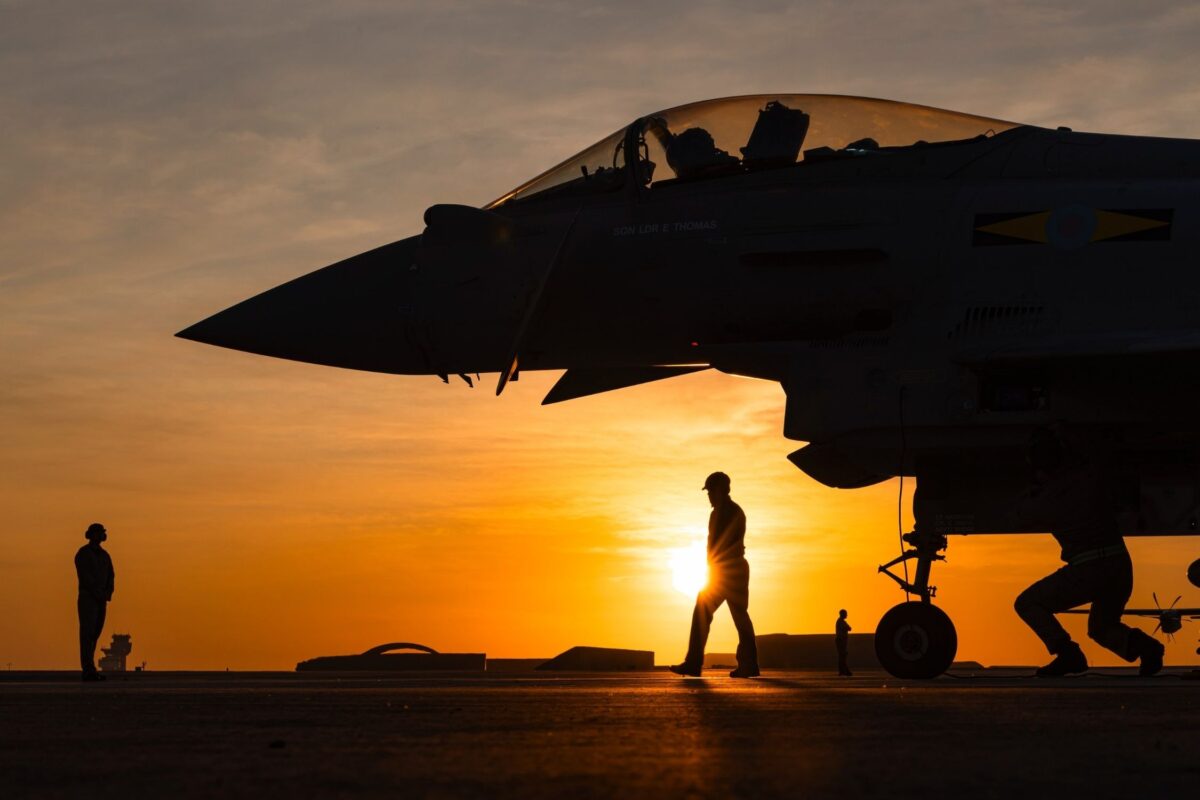 image of military jet and personnel at sunset for ex-military careers blog