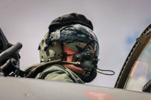 military pilot sitting in cockpit image for enhanced learning credits courses blog